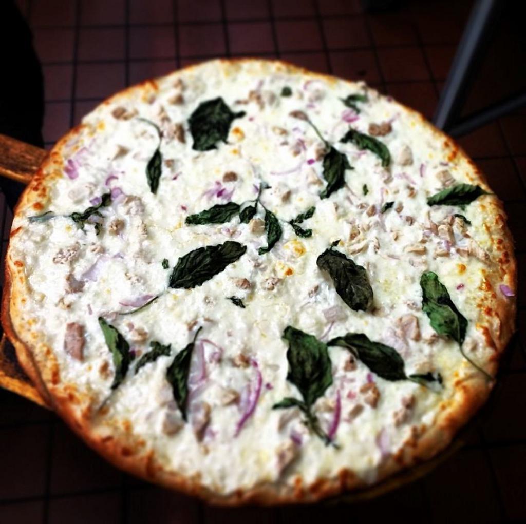 Alfredo Chicken Pizza · Grilled chicken, Alfredo sauce, red onion and basil.
