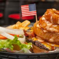 4th of July Burger · Smothered in our special honey BBQ sauce and American cheese, topped with bacon, onion rings...