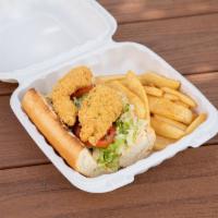 Fried Catfish Po'boy · Fried Cajun catfish nuggets served on a toasted French baguette dressed in a creamy Cajun sa...