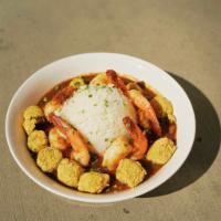 Gumbo · A Cajun stew slowly simmered in sautéed vegetables, chicken, andouille sausage and shrimp to...