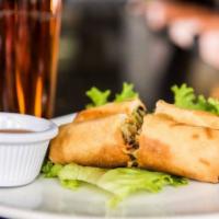 #1 Fried Sawatdee Spring Rolls · Two fried spring rolls stuffed with beef, silver-thread noodles, carrots, mushrooms, and cab...