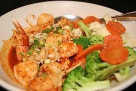 sp5 Fishermans Delight · Shrimp, scallops, squid stir-fried with spicy red curry. Served with steamed vegetables.