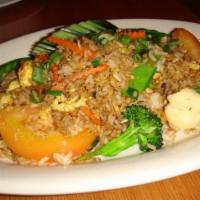 #55 Thai Fried Rice · Egg, green onions, tomato & cucumber. Gluten-Free