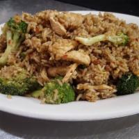 #57 Broccoli Fried Rice · Egg ,broccoli, carrots & peapods. Topped with green onions. Gluten-Free.
