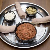 10. Kitfo · Freshly minced extra lean beef seasoned with Mitmita (special Ethiopian spice and herbed but...
