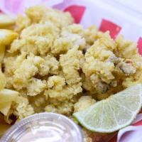 Crack Conch Snack serve with French Fries · Conch meat fied in a flour batter with our special seasoning. All snacks d