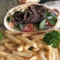 Gyro Wrap · Lettuce, tomato, onion wrapped in lavash bread and served with tzatziki sauce.