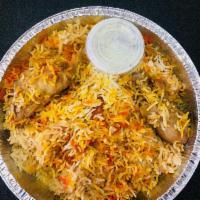 Chicken Biryani · Made with Basmati rice and some curry sauce