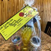 Ice cream Sundae gift basket · Includes a gift certificate for a quart of Richardsons ice cream, An ice cream sundae cup, j...