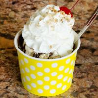 Large Sundae · Includes whipped cream, nuts and a cherry.