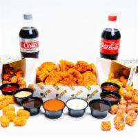 Fam Pack · 32 pieces of oven-baked crispy chicken bites seasoned with your choice of dust & served with...