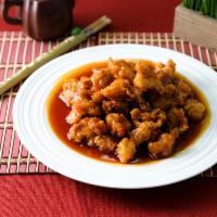 Orange Chicken · Chinese crispy chicken with homemade orange sauce and served with white rice.