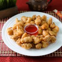 4. Sweet and Sour Chicken Combo · Served with 2 sides.