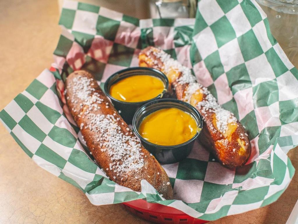 Bavarian Pretzel · 2 soft Bavarian pretzels sprinkled with salt and served with warm Fat Tire Amber Ale beer cheese sauce.