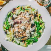 Olson's Cranberry Chicken Salad · Fresh mixed greens, grilled chicken, craisins, served almonds, feta cheese, tossed in lemon ...