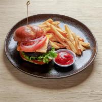 1/3 lb. The Basic Burger · Burger with lettuce, tomato and onion. Add cheese or bacon on request.