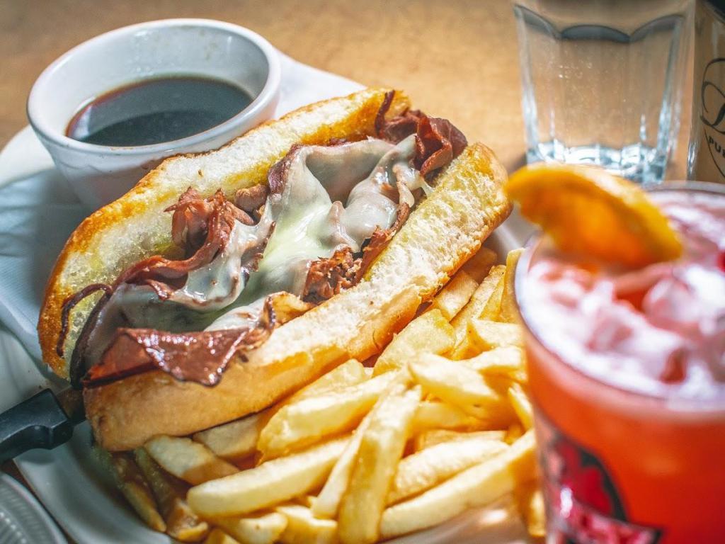 French Dip Sandwich · Thin sliced roast beef on a toasted roll with a side of au jus for dipping. Add cheese or mushrooms for an additional charge.