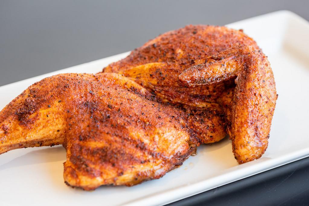 Smoked ½ Chicken (À la Carte) · Brined and dry rubbed with our House Chicken Seasoning.  Smoked hot and fast to give that traditional BBQ flavor