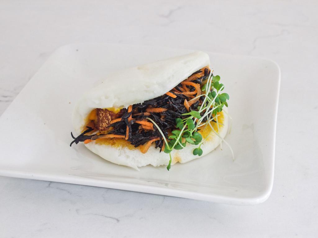 Steamed Crispy Tempeh (Vegan) · Comes with carrot puree, pickled carrots, hijiki seaweed and daikon sprouts. Vegan.