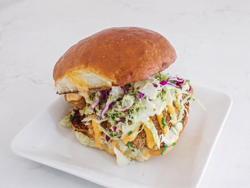 Baked Karaage Chicken Tenders  · Comes with spicy aioli, yuzu honey mustard, and cabbage slaw.