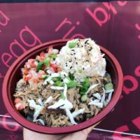 Kalua Pig · Smoke flavored, slowly cooked shredded pork with cabbage. Served with tomatoes, onions, pork...