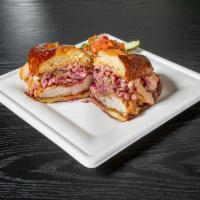 Odi's OMG Fried Chicken Sandwich  · Tangy cabbage slaw and a special house sauce served on a choice of a pretzel hoagie or hambu...