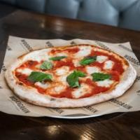 Margherita Pizza · Marinara, basil, cherry tomatoes, fresh mozzarella and olive oil drizzle.