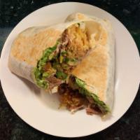 Burrito Sonora · HUGE burrito filled with rice, whole beans, pico de gallo, fresh guacamole, sour cream, medi...