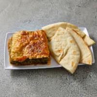 Spinach Pie · Spanakopita! Our house-made recipe. Served with pita bread, rice pilaf and green beans.
