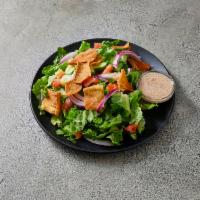 Fattoush Salad · Fresh romaine lettuce, chopped tomatoes, sliced red onions, cucumbers, and red cabbage. Toss...