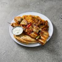 Chicken Shish Kabob- Double Skewer · Marinated and seasoned chunks of grilled chicken breast on a skewer with peppers and onions....