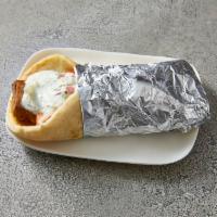 Chicken Gyro Pita · Marinated grilled chicken breast served on grilled pita bread with tomatoes, onions and hous...