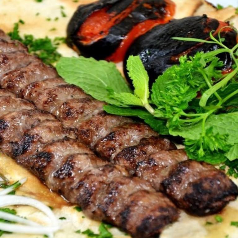 Beef Kofta Pita · Skewer of ground beef marinated with onion, salt pepper, saffron, sumac, cayenne pepper and touch of butter and grilled to perfection; rolled in a Pita, comes with fries