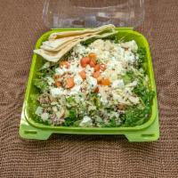 Kale and Quinoa Salad · Crunchy kale, romaine, red quinoa, white quinoa, feta cheese, toasted almonds tossed with Gr...