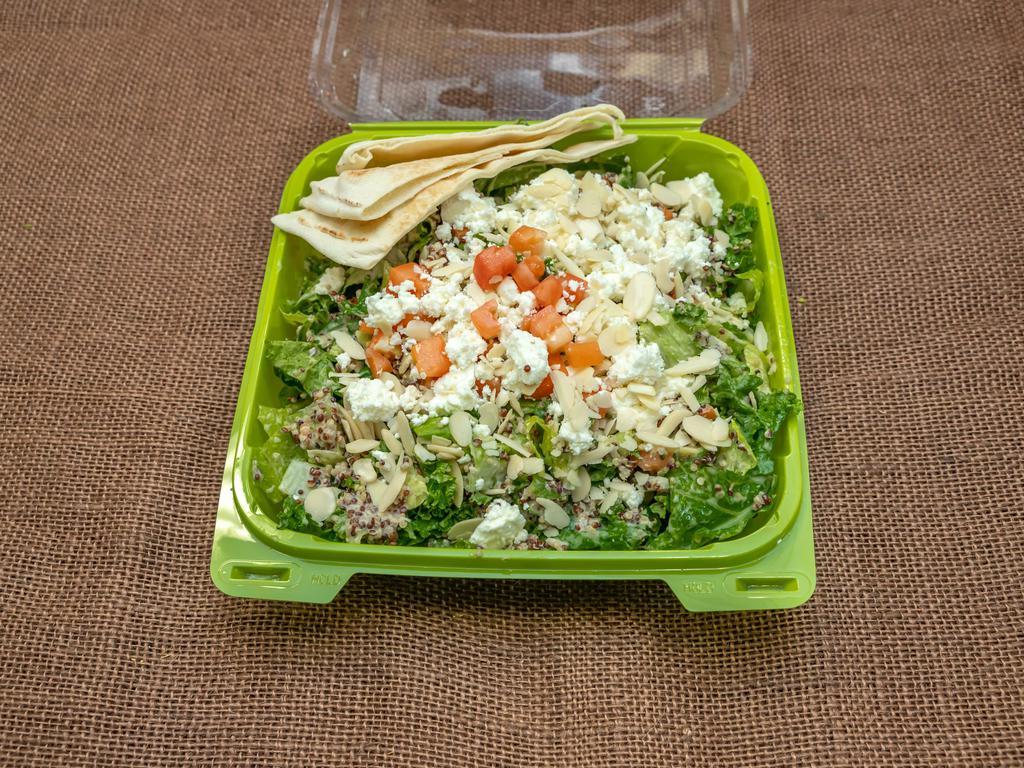 Kale and Quinoa Salad · Crunchy kale, romaine, red quinoa, white quinoa, feta cheese, toasted almonds tossed with Greek dressing.