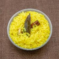 Saffron Rice · Our staple saffron rice is cooked fresh daily with cinnamon, bay leaf, and other Mediterrane...