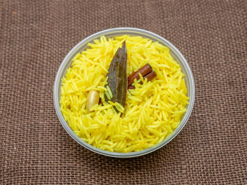 Saffron Rice · Our staple saffron rice is cooked fresh daily with cinnamon, bay leaf, and other Mediterranean spices with a dash of saffron!