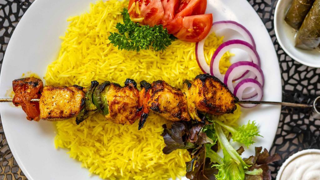 Chicken Shish Kabob Plate · Marinated chicken with onion, garlic, ginger and other Mediterranean spices and olive-oil. Served with Saffron Rice, Classic Hummus, Tabbouleh Salad  and pita bread. 