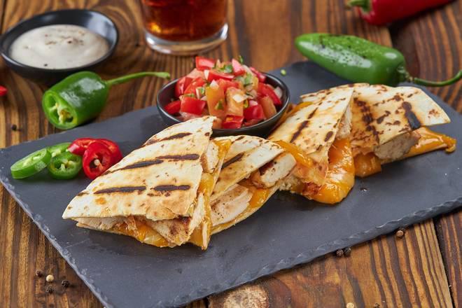 Chicken Quesadilla · Soft Wheat tortilla filled with chicken, Monterrey Jack cheese with a side of pico de gallo.