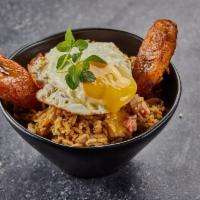 LATINO FRIED RICE · Fries rice, veggies, sweet plantain and fried egg on top. 