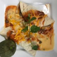 Enchilada Plate · Served with your choice of filling, tomato sauce, melted queso,
topped with sour cream, and ...
