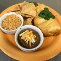 Chimichanga Plate · Hand-rolled chimi. Served with your choice of filling, fried golden
brown, topped with our z...