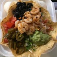 Cancun Salad · Grilled shrimp, and crab meat bedded on fresh chopped lettuce, topped
with grated cheddar ch...
