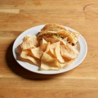 Poblano Chicken Tacos · Cabbage, cheddar Jack cheese, cilantro and cumin lime aioli served with fresh tortilla chips...