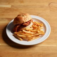 The Union Burger · Fresh NDSU premium ground beef served with cheddar cheese, bacon and BBQ sauce topped with c...