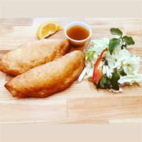 Steak  Empanada · Stuffed with onions, red bell peppers, and carrots pickle served with Fresno chili sauce on ...