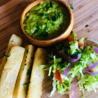 Low Carb Yuca Fries · Yuca fries served with avocado poblano dressing, avocado, roasted poblano peppers, green oni...