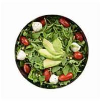 Arugula Salad · Fresh arugula, cherry tomatoes, pine nuts, fresh mozzarella, topped with avocado and served ...