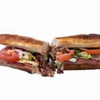 Ric's Club · Black Forest ham, smoked turkey, applewood smoked bacon and Swiss cheese with lettuce, tomat...