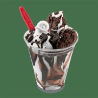 Brownie and Oreo Cupfection Treat · Soft serve, topped with a Triple Chocolate Brownie, OREO® cookie pieces, rich chocolatey sau...